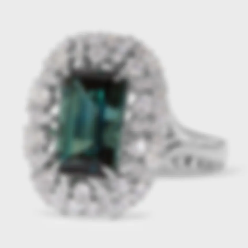 Cinquale white gold ring by ValeOro with a blue-green tourmaline in a leaf-shaped diamond halo, three-quarter view