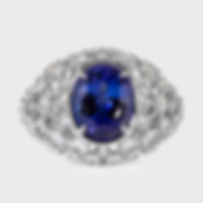 Venezia white gold ring by ValeOro with an oval blue-violet tanzanite in a domed openwork diamond setting, front view