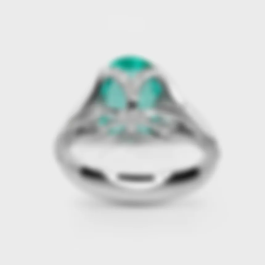 Laguna Paraiba white gold ring by ValeOro showing the openwork diamond-set gallery beneath the green tourmaline, back view