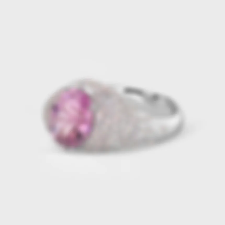 Cabo da Roca white gold ring by ValeOro with an oval pink spinel and diamonds scattered along the shank, three-quarter view
