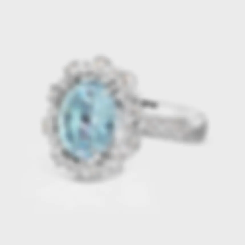 Salema white gold ring by ValeOro with an oval blue aquamarine and a diamond pavé band, three-quarter view