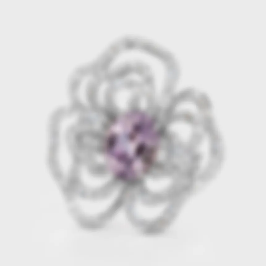 Moraea white gold ring by ValeOro with an oval lavender spinel in an openwork flower setting, front view
