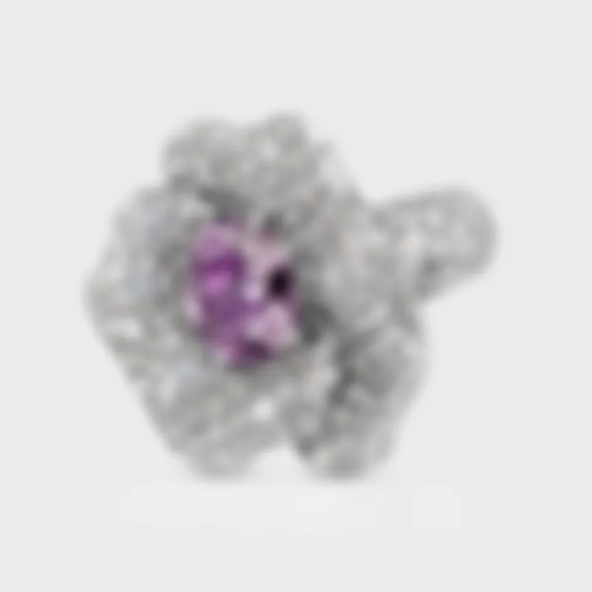 Hermanus white gold flower ring by ValeOro with a violet spinel and pavé diamond petals, three-quarter view