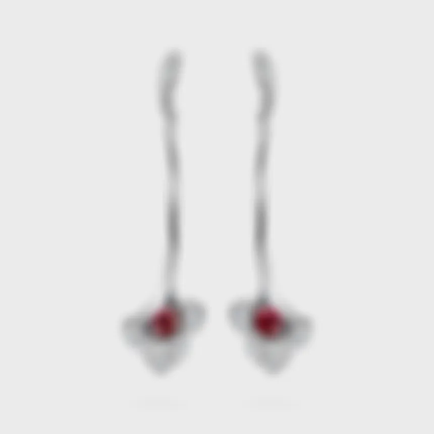 Lily white gold drop earrings by ValeOro with red sapphires in diamond flowers, front view