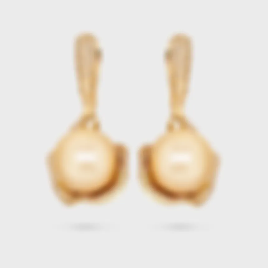 Tahiti Yellow earrings in yellow gold by ValeOro with golden South Sea pearls in shell-shaped diamond settings, front view
