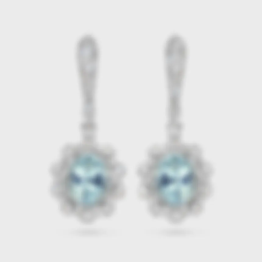 Salema white gold drop earrings by ValeOro with oval blue aquamarines in floral diamond halos, front view