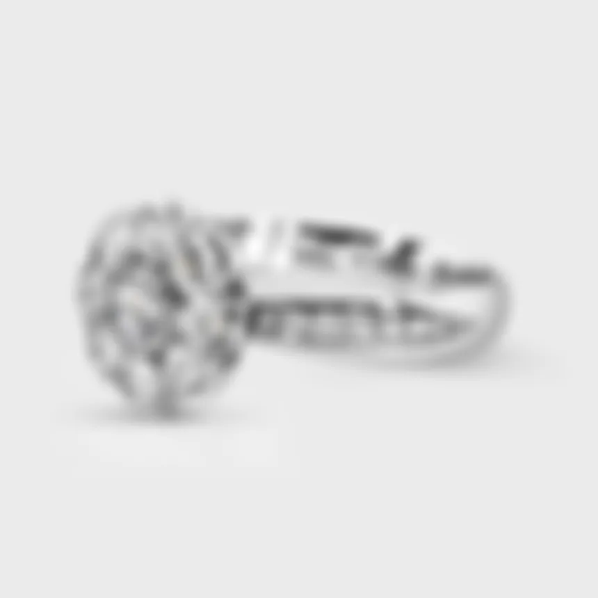 Amaryllis white gold diamond ring by ValeOro with a raised diamond flower and a diamond-set shoulder, side view