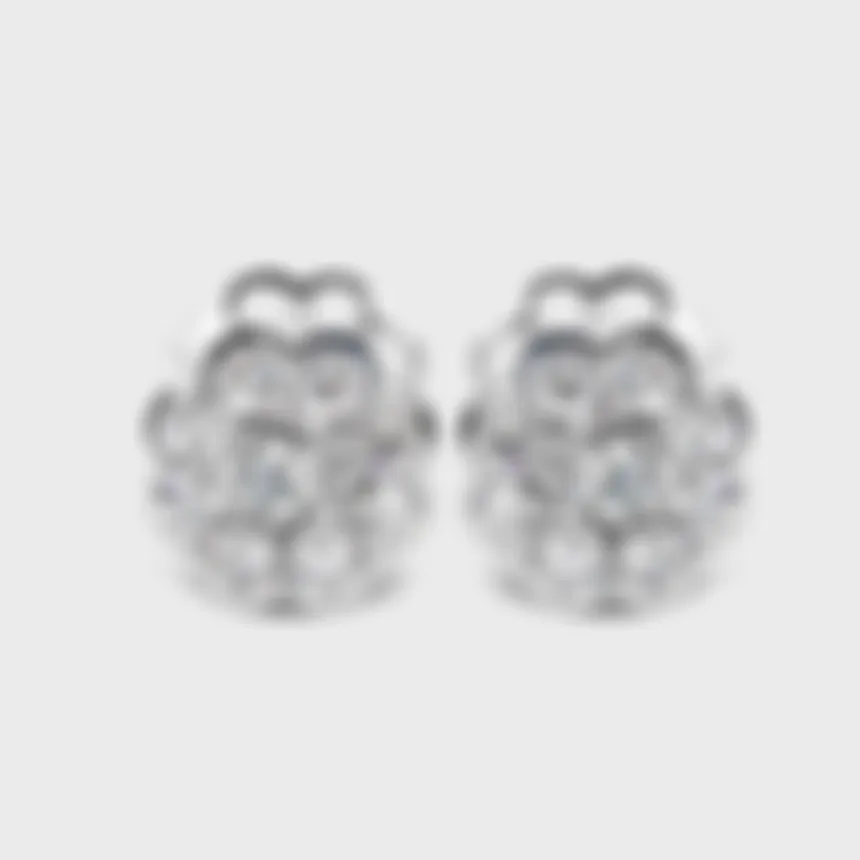 Amaryllis white gold stud earrings by ValeOro with diamonds set in a flower-shaped cluster, front view