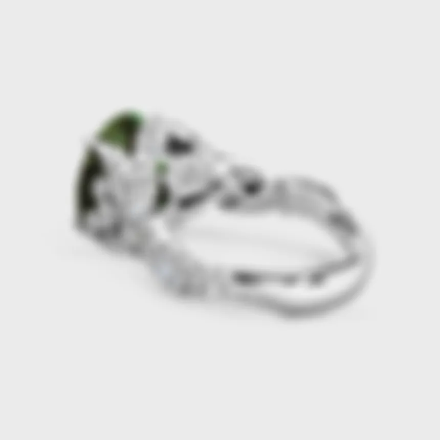 Glorioza white gold ring by ValeOro showing the green tourmaline and diamond foliate shank in profile, side view