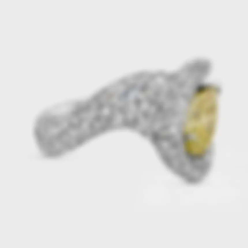 Yin-Yang white gold ring by ValeOro with a fully pavé-set wave band curving toward the yellow diamond, side view
