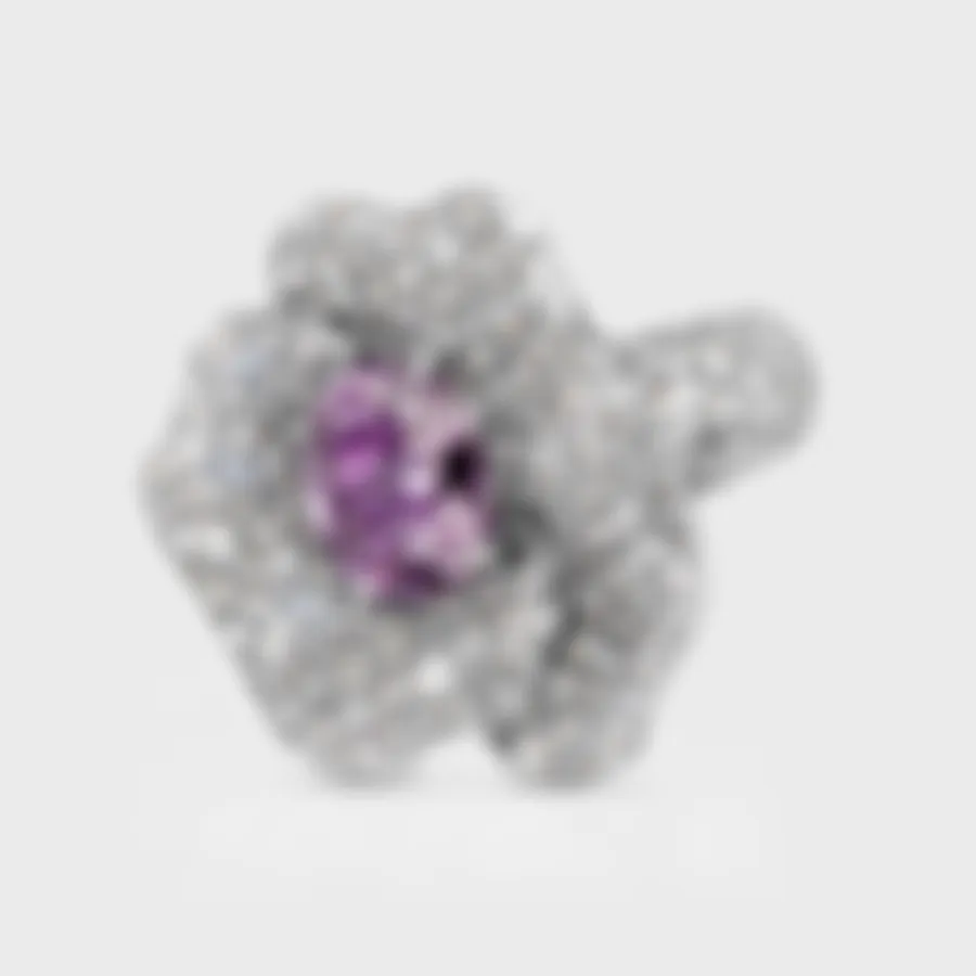 Hermanus white gold flower ring by ValeOro with a violet spinel and pavé diamond petals, three-quarter view